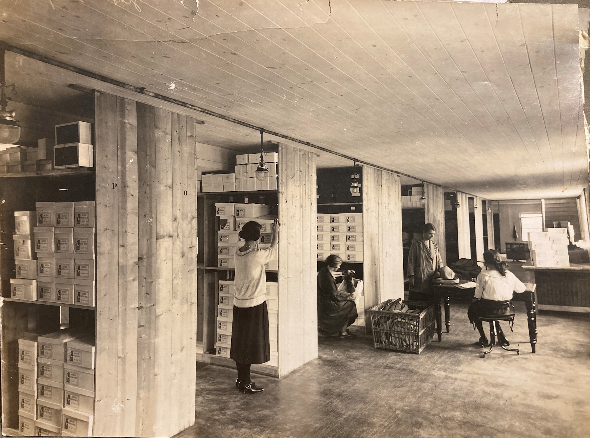 Blanche Blurton (centre) working in the Morlands stockroom, 1920s
Photo: Sally Hill