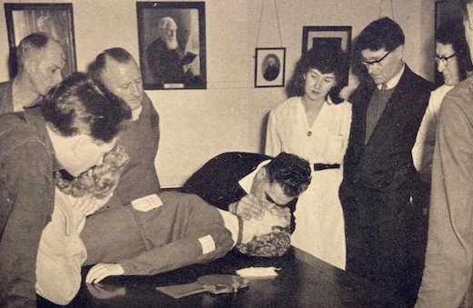 First aiders at Morlands are shown the 'kiss of life'
Photo: Morlands Magazine, Spring 1961
